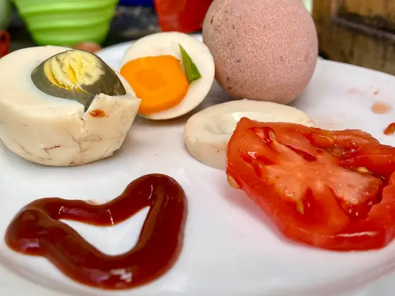 Boiled eggs with cucumber sticks
