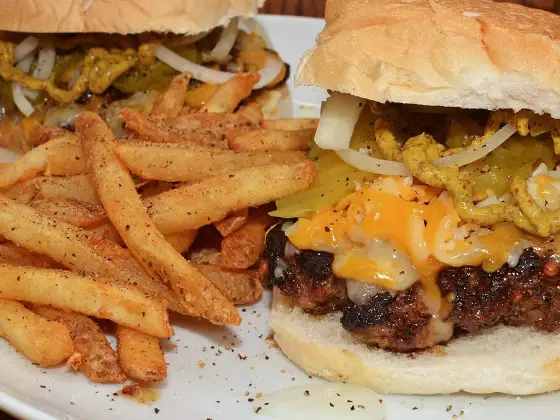 Homemade cheeseburger and oven fries