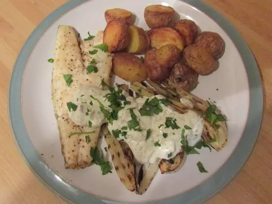 Roast cod with tomatoes and olives